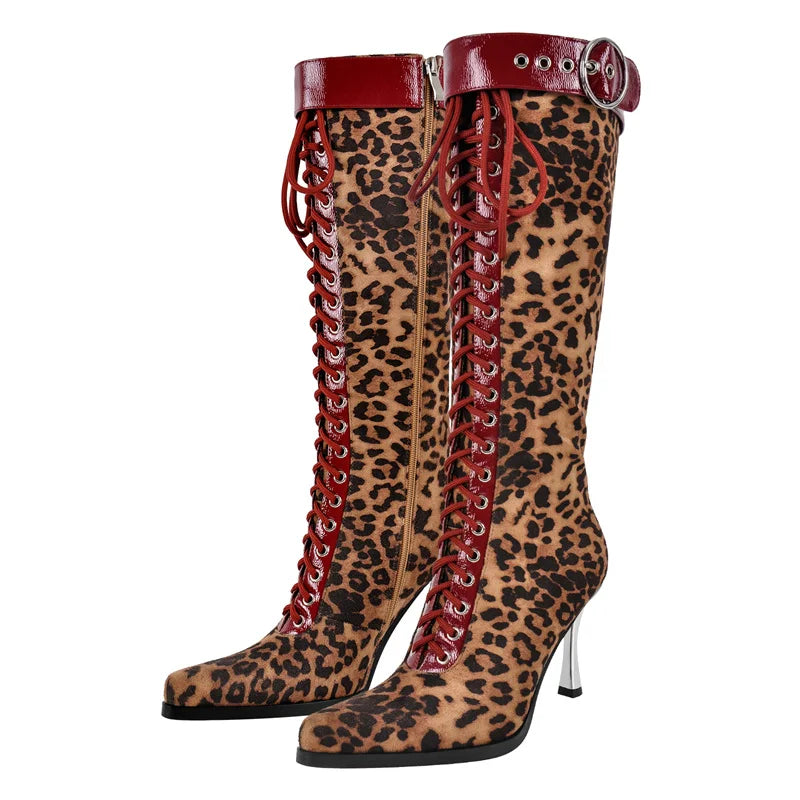 Pair of leopard print lace-up knee high boots with silver buckle detail