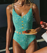 Tweed chain strap two-piece set with button accents.