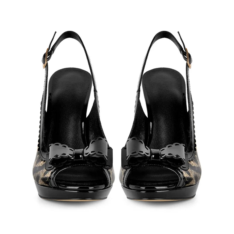Front view of a pair of leopard print patent leather Pumps with bows