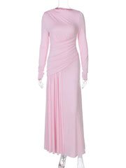 Pink dress on a mannequin against a white background