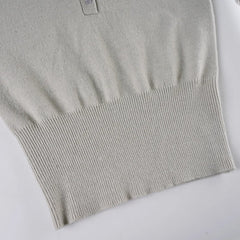 Gray knit sweater on a white background