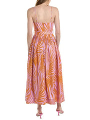 Woman wearing a colorful dress with a white background