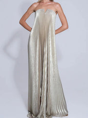Silver strapless gown on a plain background