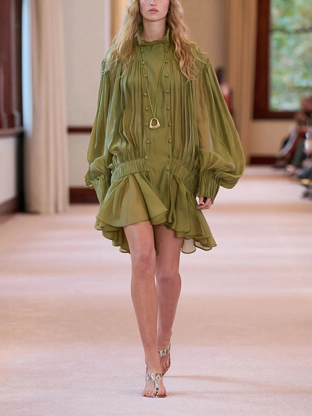 Olive green lantern sleeve mini dress with pleated skirt