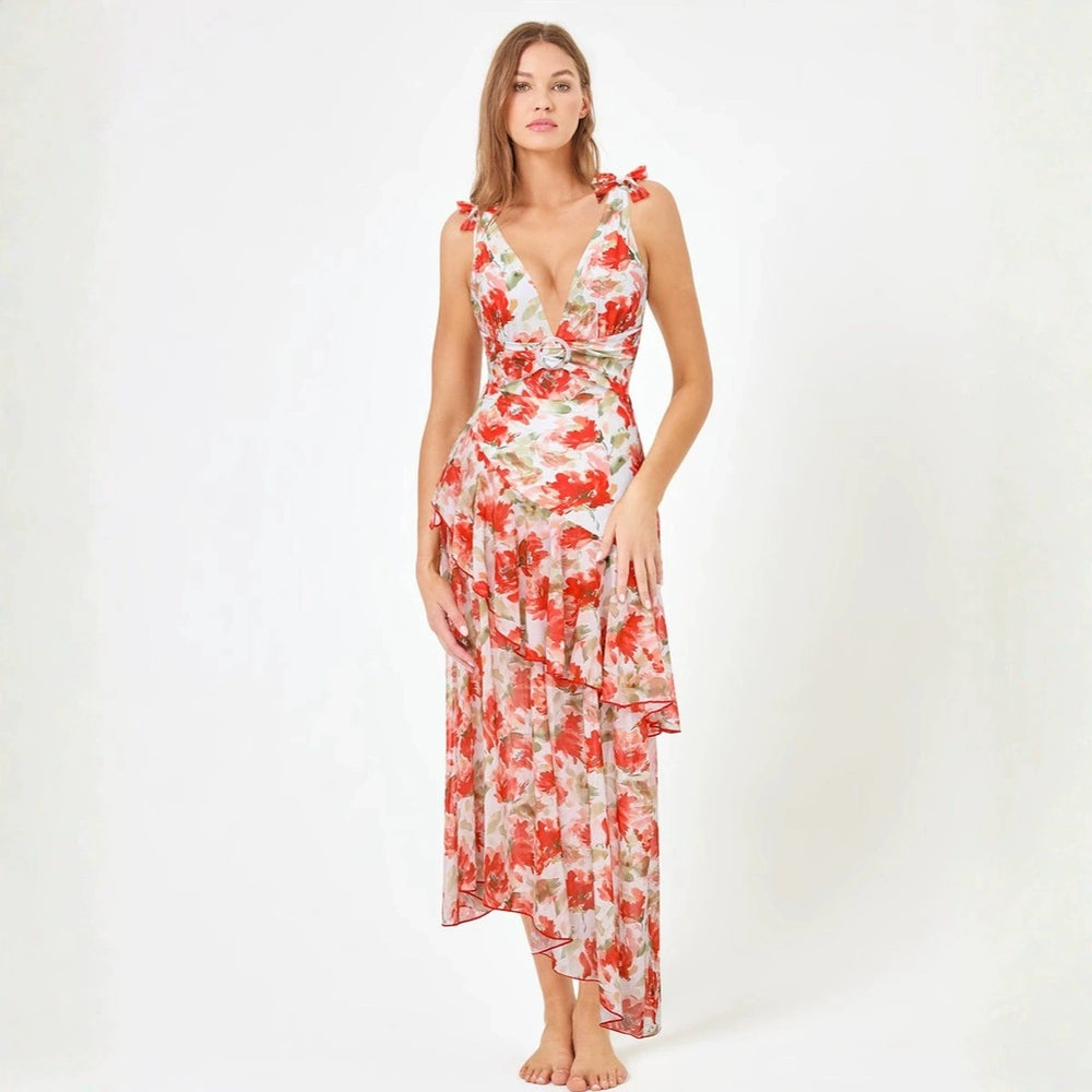 Botanical print two-piece swimwear set with ruffled neckline and adjustable ties.
