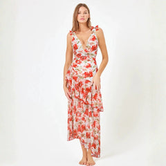 Botanical print two-piece swimwear set with ruffled neckline and adjustable ties.