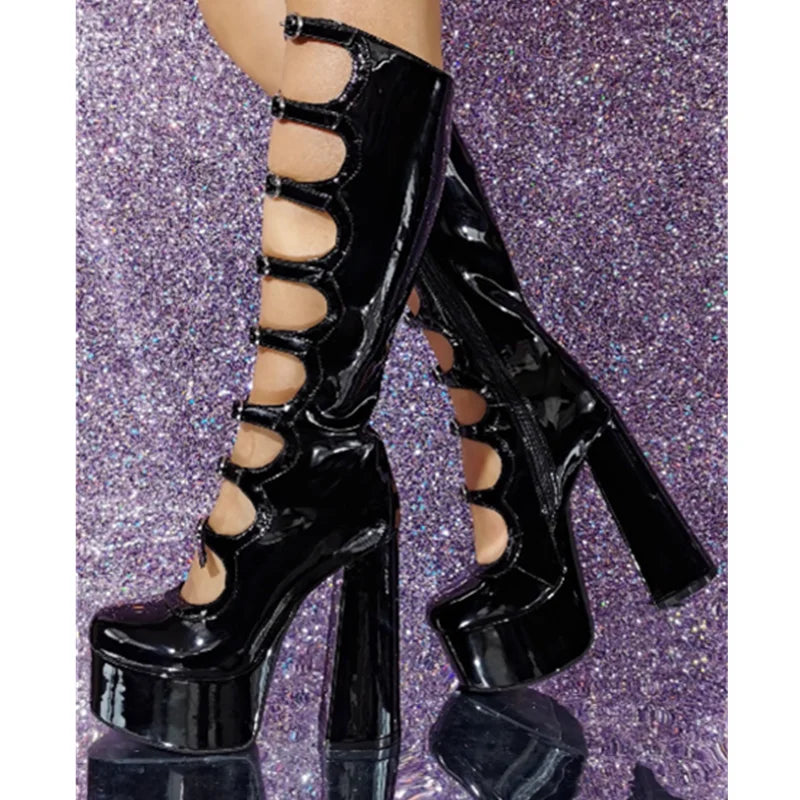 Black platform heels on a glittery purple background