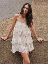 Beige lace trim halterneck mini dress