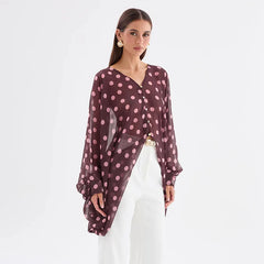 Polka dot V-neck top detail