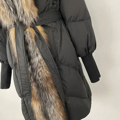 Black puffer coat with fur trim on a neutral background