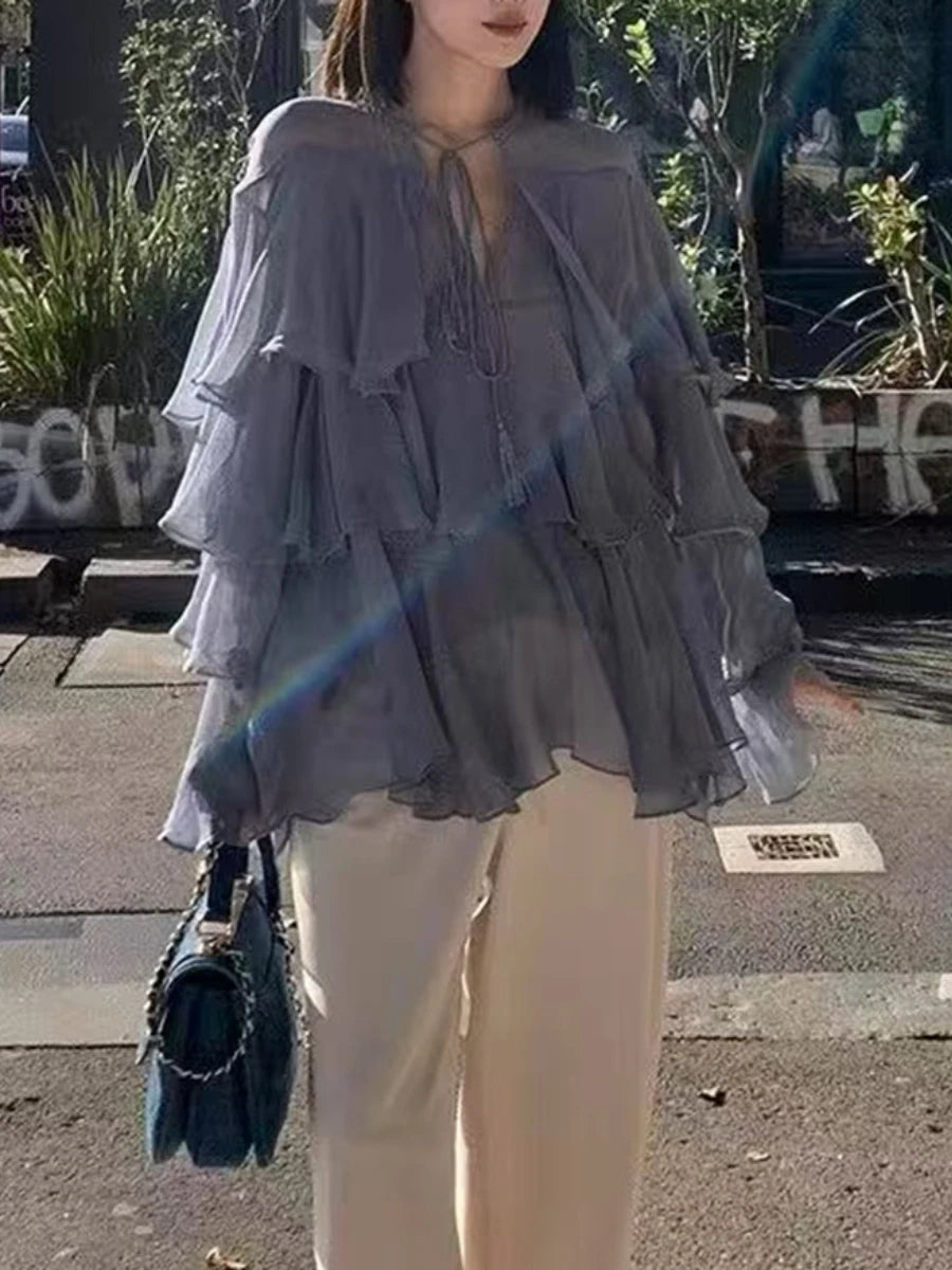 Long sleeve blouse with butterfly sleeves and cascading tiers