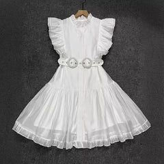 White dress with ruffled sleeves and a belt on a dark background