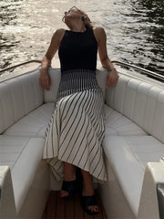 Back view of a colorblock ribbed knit midi dress.