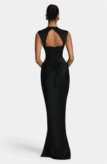 Back view of merlot satin cowl neck mermaid maxi dress with lace-up detail