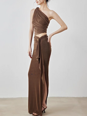 Brown one-shoulder dress with a cutout design on a white background