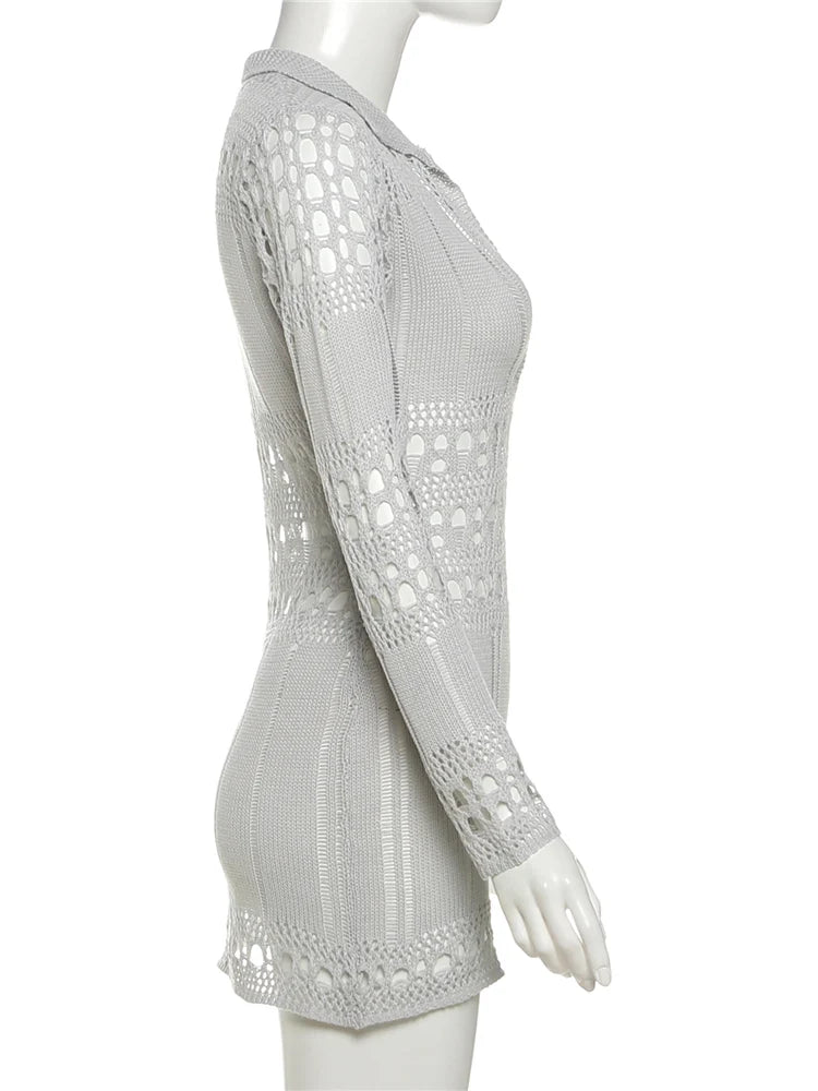 Light gray crochet dress on a mannequin