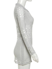 Light gray crochet dress on a mannequin