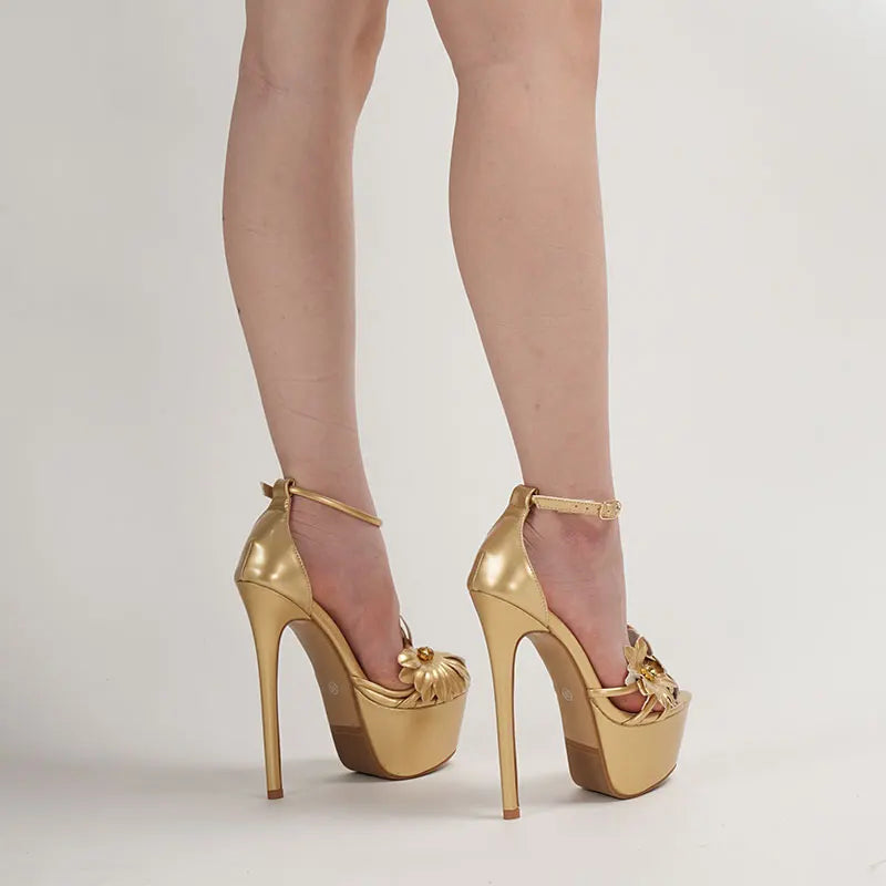 Gold high-heeled shoes worn with sheer stockings