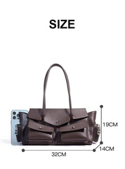 Brown handbag with measurements on a white background