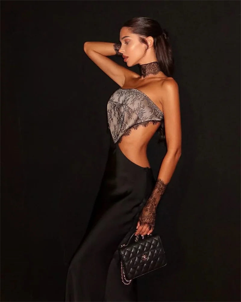 Woman in a stylish outfit with a black background