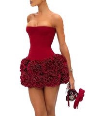 Red strapless dress with ruffled skirt on a white background
