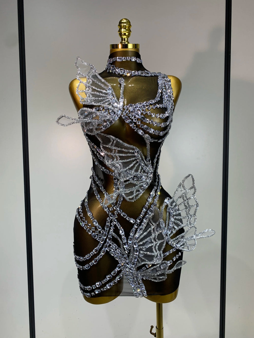 Crystal butterfly mini dress with sheer mesh and high neckline