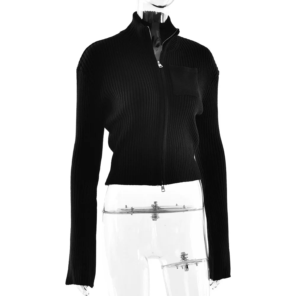 Black ribbed sweater on a mannequin against a white background