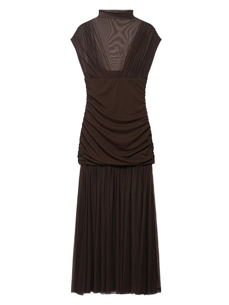 Brown dress with a patterned top on a white background