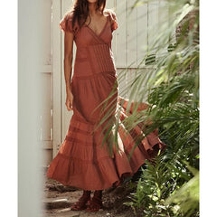 Brown puff sleeve V-neck maxi dress with lace details.