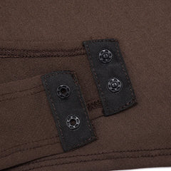 Close-up of brown fabric with button details