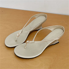 Champagne buckle strap wedge heel flip flops
