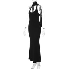 Black halter neck dress on a mannequin against a white background