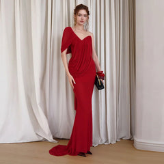 Red draped one-shoulder evening gown from the back