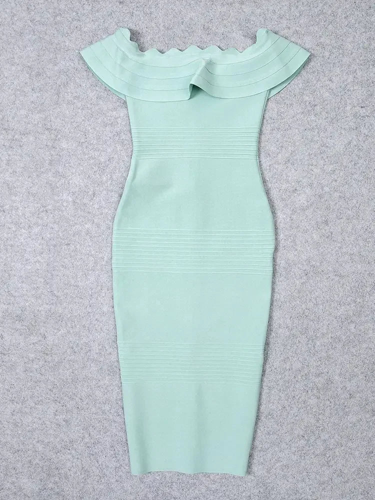 Mint green off-shoulder dress on a gray background