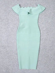 Mint green off-shoulder dress on a gray background