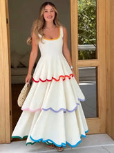 White ruffled hem maxi dress with colorful trim