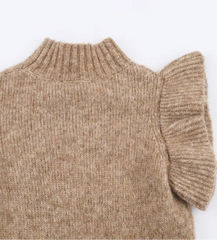 Beige sweater with ruffled sleeves on a white background