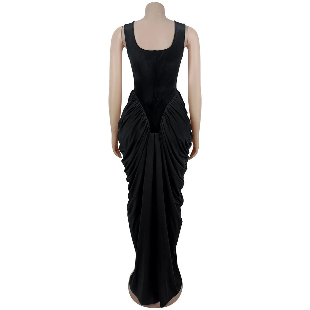 Black evening gown on a mannequin against a white background