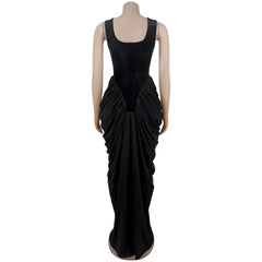 Black evening gown on a mannequin against a white background