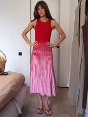 Colorblock ribbed knit midi dress with sleeveless design.