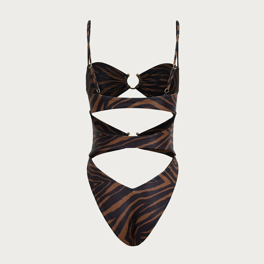 Zebra print cutout one-piece swimsuit displayed flat, back view.