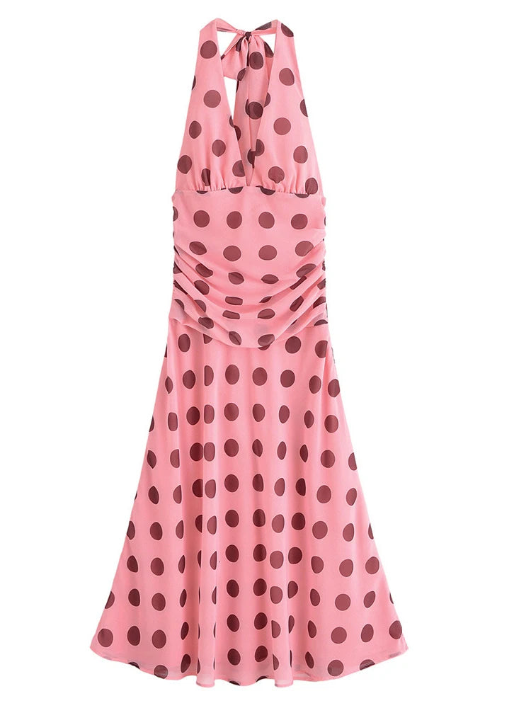 Pink dress with brown polka dots on a white background