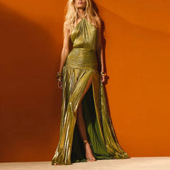 Woman wearing a green metallic dress against an orange background