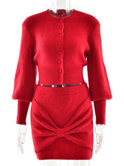 Red ribbed sweater and skirt set on a mannequin against a white background