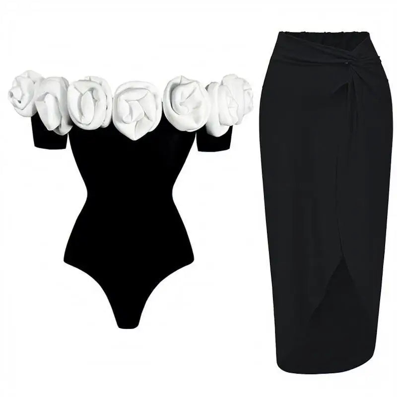 Off-the-shoulder rose embellished bodysuit and twist front skirt set in black with white roses
