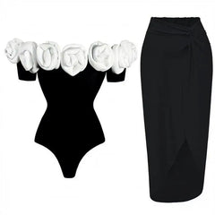 Off-the-shoulder rose embellished bodysuit and twist front skirt set in black with white roses