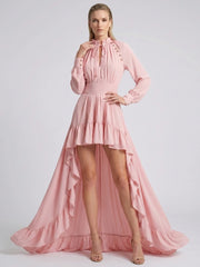 Pink high-low hem dress with long sleeves and lace-up neckline