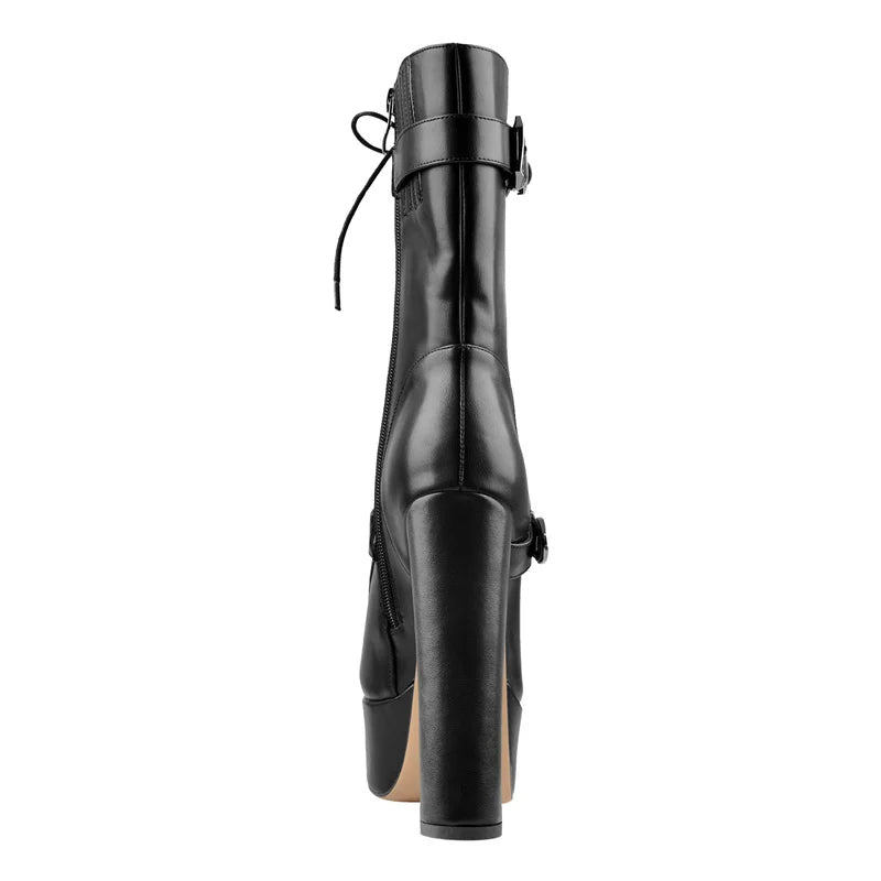Side view of black faux leather platform ankle boots