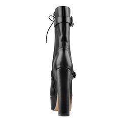 Side view of black faux leather platform ankle boots
