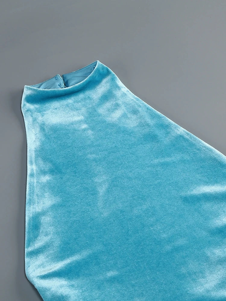 Blue velvet fabric on a gray background